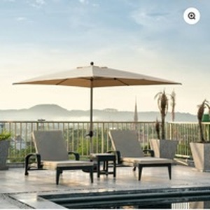 lot 70 image: Domi Outdoor Living 9FT x 11.5FT Rectangular Patio Umbrella with Base - Retail $150