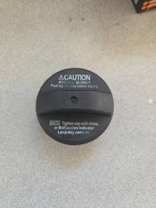 lot 2985 image: Dtomi Fuel Tank Filler Cap, Tacoma, Camry, GX470, Corolla, 77300-33070 - Retail $7