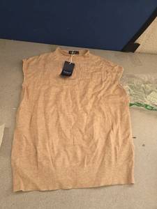 lot 61 image: Small Sleeveless Sweater Material Shirt - Retail $0