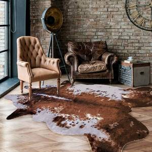 lot 68 image: ARJINCUTE Faux Fur Cowhide Rug 5 x 6.6 ft, Cow Print Area Rug Cute Animal Printed Carpets for Bedroom Living Room Rustic Western Home Decor, No Shedding and Easy to Clean - Retail $55
