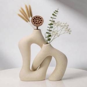 lot 174 image: White Ceramic Decorative Vases Set of 2, Nordic Minimalist Modern Vases for Table, Wedding, Living Room, Bedroom, Office Home Decoration - Retail $27