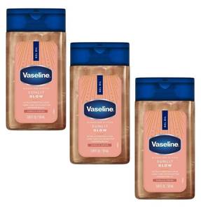 lot 18602 image: Vaseline Glazed and Glisten Sunlit Glow Ultra-Hydrating Lipids 1.69 fl oz 50mL Vanilla Cocoa (3 Pack) - Retail $11