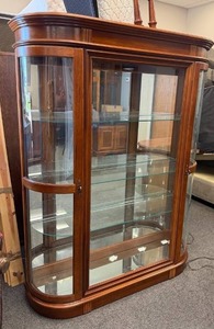 lot 807 image: Pulaski top lit dual curved door mirrored back curio cabinet 62 x 48 x 13 in