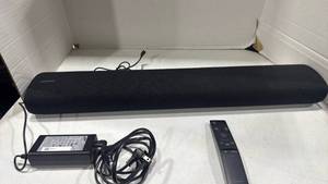 lot 1000 image: Samsung sound bar with remote