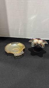 lot 1009 image: Iridescent carnival glass compote with a ruffled rim, and iridescent marigold carnival glass shell-shaped dish