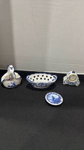 lot 1013 image: Delft small clock, basket and more small plate has a chip on it