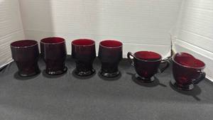 lot 1018 image: Anchor Hocking Georgian Royal Ruby Red glass tumblers and two-piece creamer and sugar bowl set made of deep ruby red glass