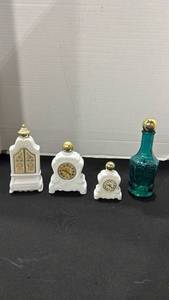 lot 1031 image: Vintage Avon milk glass and colored glass bottles