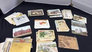 lot 1050 image: Vintage post cards dating back early 1900s have been written on