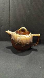 lot 1067 image: McCoy pottery brown drip tea pot