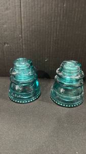 lot 1069 image: Pair of Glass aqua blue Insulators Made in USA