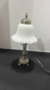 lot 1088 image: Vintage-style accent table lamp featuring an ornate metal base and a ruffled frosted white glass shade 13.5 inches tall