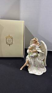 lot 1115 image: Lenox Heavens Grace porcelain angel figurine 8 inches tall with COA