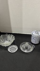 lot 1147 image: Blue and white speckled stoneware cheese or butter crock, citrus juicer, Indiana Glass Lily Pons pattern bowl, and more small chip on juicer
