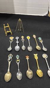 lot 1150 image: Souvenir spoons and small display stands