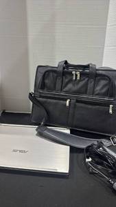 lot 1159 image: Asus laptop with charger and Wilsons Leather case