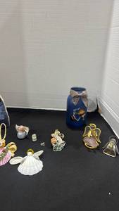 lot 1187 image: Stained glass angel figurines, shells and more one is needed repaired
