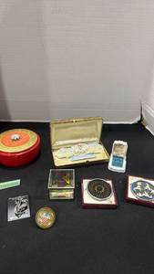 lot 1193 image: Wing heart small stained glass hangings, mirror box, Vintage Avon dusting powder container and more