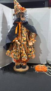 lot 1250 image: Halloween Witch Decoration Orange Black Cape Pumpkin Print and more 38 inches tall