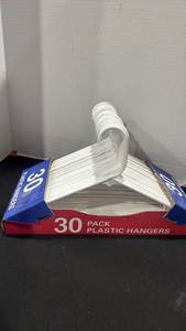 lot 1289 image: 30 Pack Plastic Hangers White