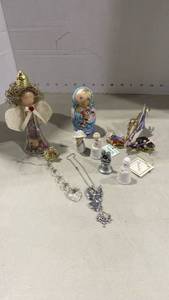 lot 2016 image: Russian nesting dolls, travel angels, Precious Moments miniatures