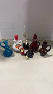 lot 2022 image: Avon cologne bottles and miniature glass pitchers
