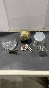 lot 2089 image: Cloisonne bell, metal decorative sphere, tiny dachshund and more