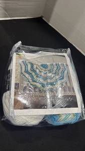 lot 2214 image: Yarn with instructions for blanket
