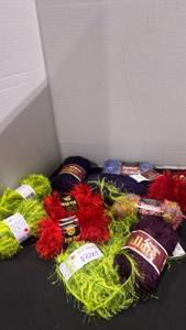 lot 2234 image: Red heart and other yarn