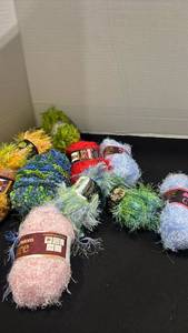 lot 2239 image: Lion brand and other yarn
