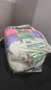 lot 2243 image: Red heart and other yarn