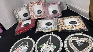 lot 2319 image: Lace hoop wall hanging featuring an embroidered baskets and heart, more
