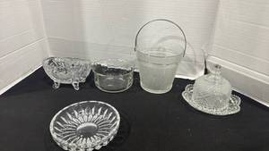 lot 2368 image: Vintage clear glass ice bucket with an embossed wood-grain and a metal swing handle, Avon butter dish, and more