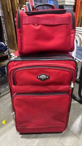 lot 2395 image: Ricardo luggage 26x17x11 with toiletries bag and locks