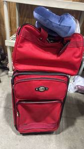 lot 2396 image: Ricardo carry-on size luggage with toiletry bag and bcozy neck pillow