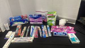 lot 2404 image: Oral Care and Personal Hygiene Supplies Lot - Toothbrushes, Toothpaste, Denture Care, Tissues