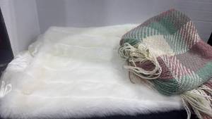 lot 2408 image: Faux fur throw blanket with crochet lap blanket and 28qt Sterilite container