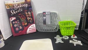 lot 2418 image: Baking sheets, cutting board, aluminum cookie cutters and more