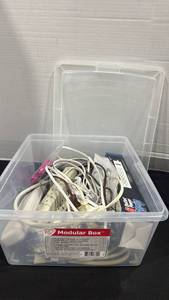 lot 2426 image: Power strips, extension cords, various chargers with Iris 4.6 gal plastic container