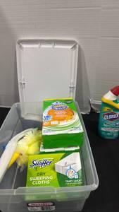 lot 2427 image: Cleaning Supplies Lot Scrubbing Bubbles, Swiffer Cloths, Clorox Gel, and more with Sterilite 16qt Storage Container