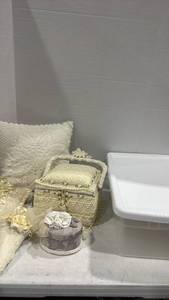 lot 2465 image: Decorative Lace Basket, address book, pillow and more with 32 qt sterilite container