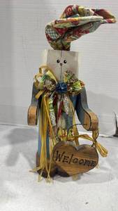 lot 2477 image: Wooden bunny figurine holding welcome sign 17 inches tall