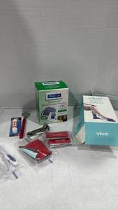 lot 2481 image: Sock assist, blood pressure monitor, and more