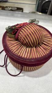 lot 1658 image: Decorative Sewing Box Round Burgundy Gold Striped with Rose Ornament