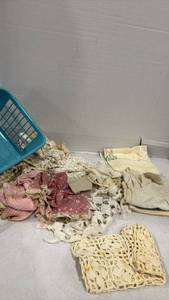 lot 2506 image: Vintage linens and doilies with basket
