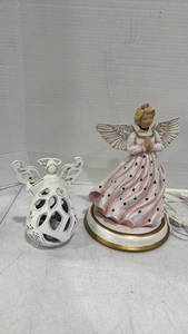 lot 2510 image: lighted ceramic praying angel figurine with glitter wings and a dress on a round base, and distressed painted iron tea light holder
