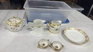 lot 2517 image: Hand painted Nippon salts, creamer and sugar bowl saucer and Sterilite container