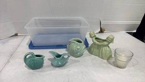 lot 2519 image: USA Pottery Mint Green Dancing Dutch Girls Planter, fish planter and more some chips