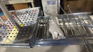 lot 2553 image: Stainless steel shelving not put together