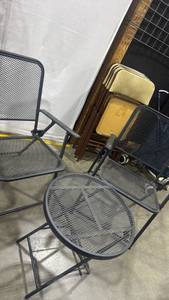 lot 2704 image: Metal mesh patio set including 2 chairs and 1 table 20x18 chair seat is 17.5